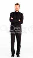 Serious businessman with folded arms