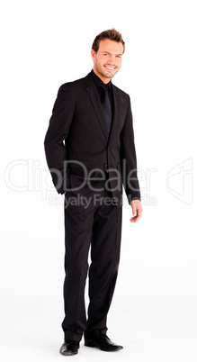 Smiling businessman standing in front of the camera