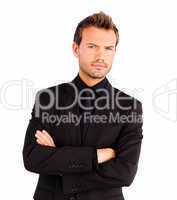 Young businessman with folded arms