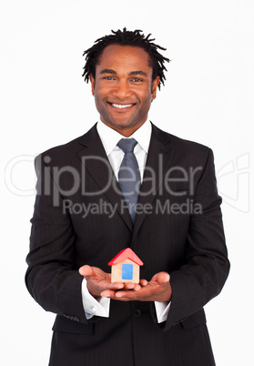 Friendly businessman showing constructions of house