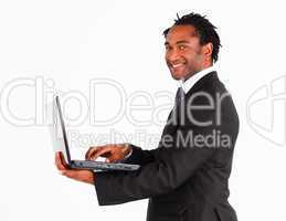 Closeup of businessman working on laptop