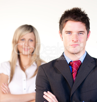 Confident businessman in front of a businesswoman