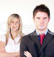 Confident businessman in front of a businesswoman