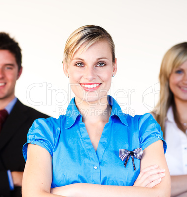 Beautiful businesswoman with her team in the background