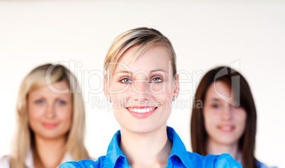 Portrait of three businesswomen smiling at the camera