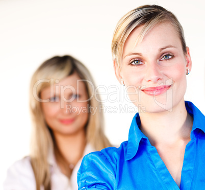 Portrait of two beautiful blonde businesswomen