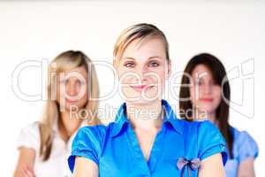 Confident businesswomen smiling at the camera