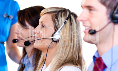 Team of people talking with headsets on
