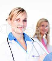 Portrait of a beautiful doctor with a nurse