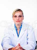 Confident female scientist looking at the camera