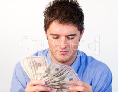 Handsome man counting dollars