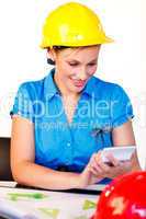 Portrait of young woman with hard hat