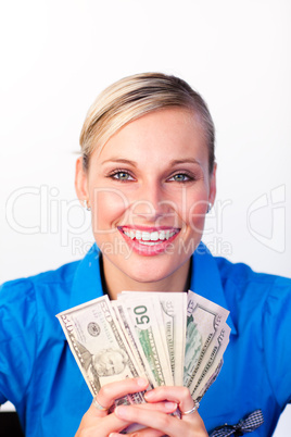 Businesswoman holding money in her hands