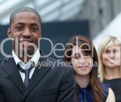 Afro-American businessman in front of his colleages