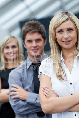 Portrait of a businesswoman in front of her team