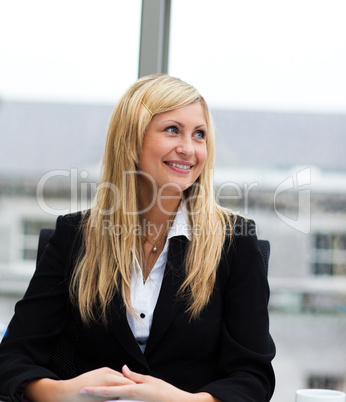 Smiling businesswoman in a meeting