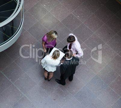 High angle of businessteam interacting with each other