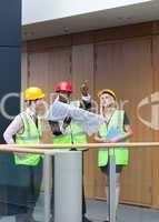 Young architects studying a building