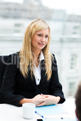 Beautiful businesswoman in a meeting