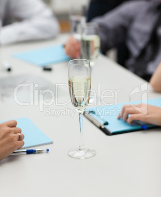 A glass of champagne in office
