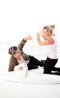 Couple having a pillow fight