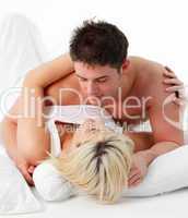 Portrait of a romantic couple on bed