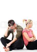 Couple in an argument sitting on the floor