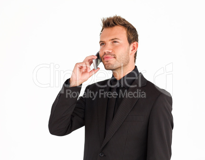 Attractive serious businessman talking on phone