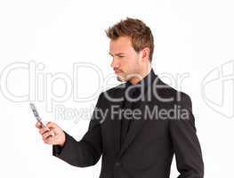 Serious attractive businessman texting