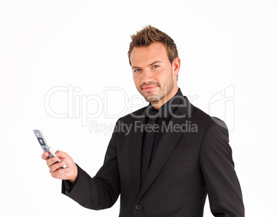 Businessman writing a message and looking at the camera