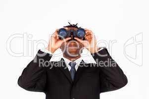 Businessman with binoculars