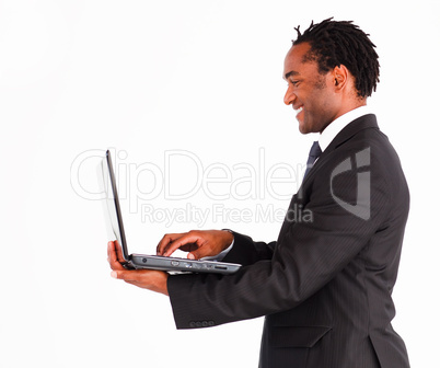 Afro-american businessman working on laptop