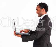 Afro-american businessman working on laptop