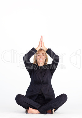 Smiling businesswoman in buddha position