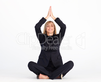 Businesswoman doing relaxation exercises