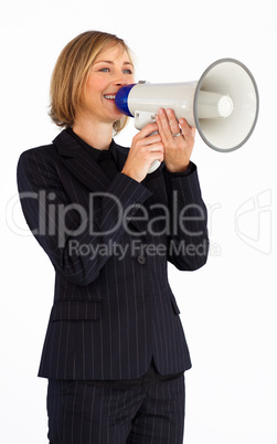 Blonde businesswoman speaking into a megaphone