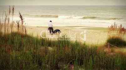 (1004) Beachcomber and Dogs Ocean Beach Waves Early Morning Summer