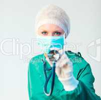 Surgeon holding stethescope outwards