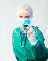 Surgeon holding stethescope outwards