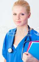 Young female doctor holding a folder