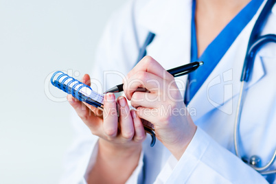 Doctor writing a perscription