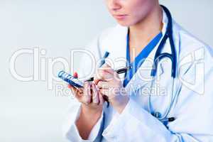 Doctor writing a perscription