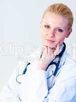 Young female doctor looking at camera