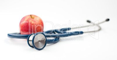 Stethoscope and an apple