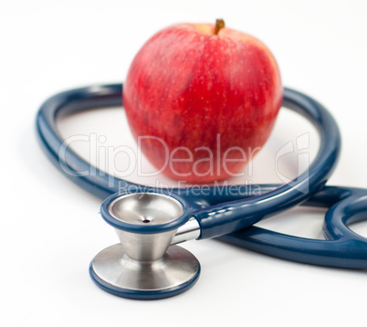 Stethoscope and an apple