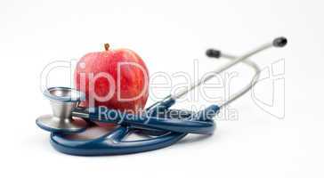 Stethoscope and an apple