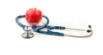 Stethoscope and an apple