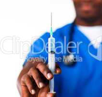 Doctor holding a syringe