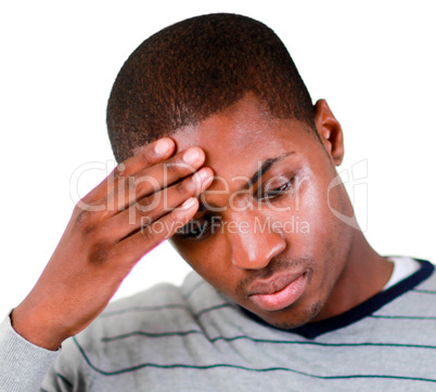 Stressed man with hand on his forehead