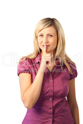 Woman with finger to lip